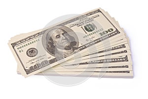 100 US Dollar bills bundles stack isolated on white background with clipping path