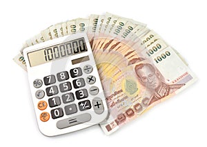1000 baht banknotes and calculator photo