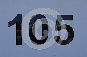 105 black number on white background