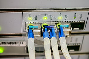 10G main server interfaces. Front panel of the central data center router. Modern high-speed switching equipment of the Internet