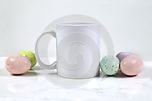 11 oz. White Coffee Mug Mockup with Colorful Speckled Easter Eggs