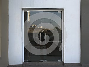 12 millimetres thick toughened glass door with stainless steel made tube glass doors and its floor and lintel mounted doors which