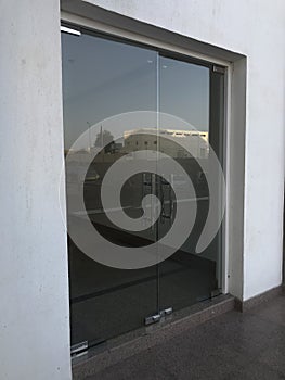 12 millimetres thick toughened glass door with stainless steel made tube glass doors and its floor and lintel mounted doors which