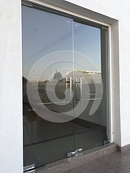 12 millimetres thick toughened glass door with stainless steel made tube glass doors and its floor and lintel mounted doors which