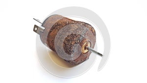 12 volt rusty DC motor with white background image