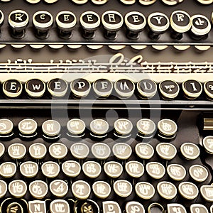 1214 Retro Typewriter Keys: A retro and vintage-inspired background featuring retro typewriter keys with vintage typography, mec