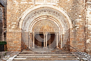 12th century tympanum is marvellous piece of sculpture, entrance to narthex of Church Eglise Saint-Pierre de Carennac, Lot, Occita