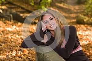 13 year old teen girl in fall foliage.