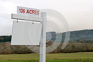 136 Acres of Land For Sale Sign