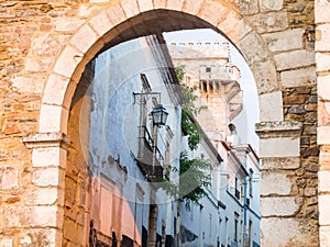 13th century entrance to the Estremoz Castle in Estremoz, Portugal. Three Crowns tower in the background