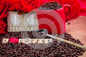 14 February rosted coffee beans with heart chocolates red flowers red mug