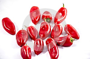 14 red sweet small peppers