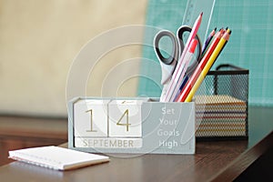 14 September. Image of september 14 wooden calendar on desktop