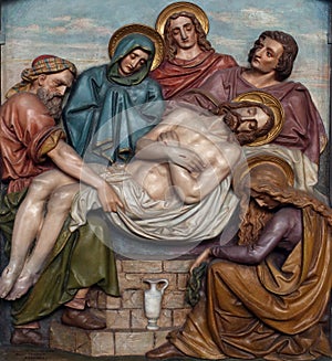 14th Stations of the Cross, Jesus is laid in the tomb and covered in incense