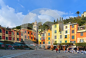 15.03.2018. facade of colorful old buildings and architecture with people walking on dock in small coastal village Portofino in Li