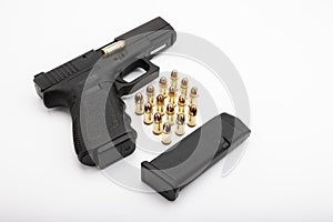 15 rounds bullets magazine and a semi-automatic pistol handgun , Gun law