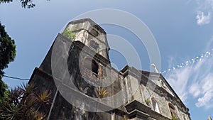 16th century Spanish built San Agustin Parish Church showing her facade.