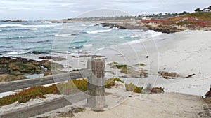 17-mile drive, Monterey, California. Rocky craggy ocean beach, waves and stairs.