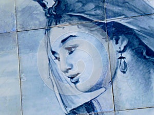 1700 image of a young woman looking. On tiles.