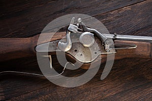17th century ancient flintlock musket with powder flask and led bullets