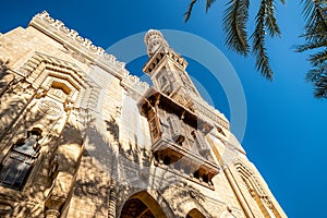 18/11/2018 Alexandria, Egypt, Incredibly beautiful mosque Abo El Abass against blue sky and palm trees