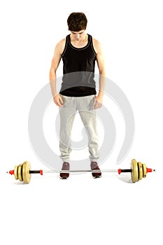 18 year old teenage boy exercising with weights