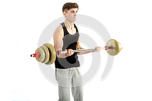 18 year old teenage boy exercising with weights