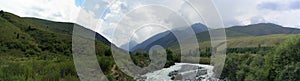 180 degree panorama of the mountains of Kyrgyzstan bird's-eye vi