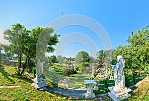 180 degrees panorama view of a rustic courtyard with statue replicas in Transylvania, Romania, copy space available over