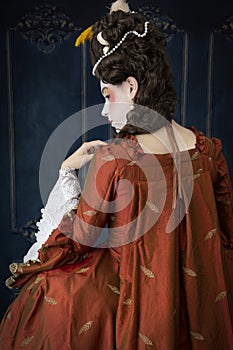 An 18th-Century woman wearing a robe a la Francaise