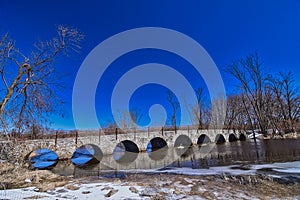 1901 Alphonse Halter palm tree road nine arch stone bridge in St. Cloud Wisconsin