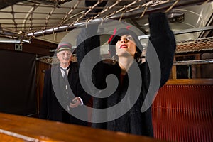 1920s woman in train interior