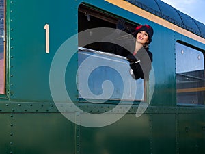 1920s woman in vintage train