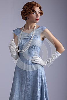 1930`s woman in blue dress