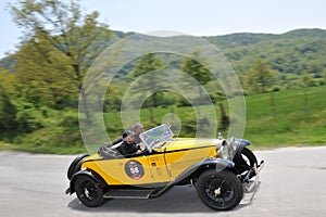 A 1930 yellow Bugatti type 40A