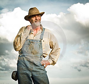 1930s farmer looking at the Sun photo