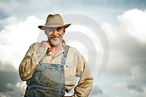 1930s farmer smiling at the camera photo