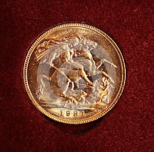 1931 Gold sovereign on red background