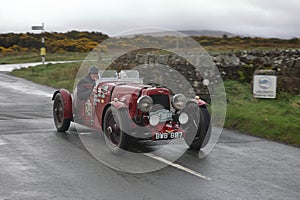 A 1934 Aston Martin Ulster Leaves Caldbeck, Cumbria in the Flying Scotsman Rally