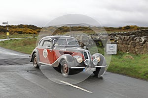 A 1938 BMW 327 28 Leaves Caldbeck, Cumbria in the Flying Scotsman Rally