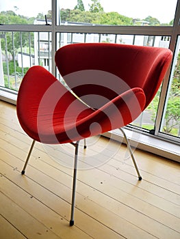 1950s: modernist red chair - side photo