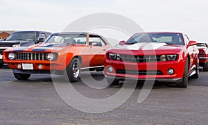 1969 & 2013 Red Chevolet Camaros