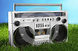 1980s Silver boom box blaster over fresh green grass