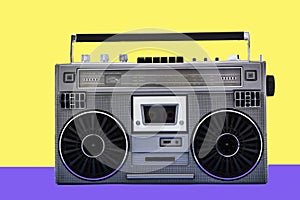 1980s Silver retro radio boom box on color background