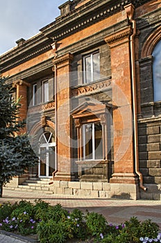 19th century black tuff building in classical style on Abovyan street in Gyumri