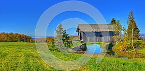 19th Century covered bridge in rural Vermont HDR.