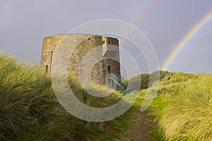 The 19th century round Martello tower fort built in the sand dunes at Magilligan Point near Limavady in County Derry in Northern I