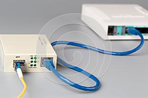 1Gbps optical media converter with SFP module connected to ethernet port SOHO router