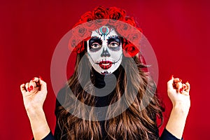 1st and 2nd november celebration of day of the dead in mexico concept woman with grimm skull face and black cloth in