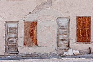 2 Boarded-up one-story houses at Historic Mining Park, Tonopah, NV, USA